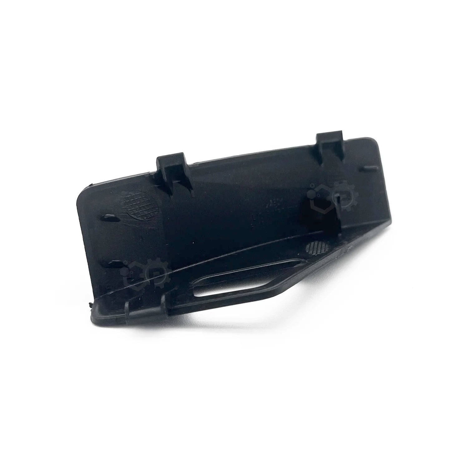Black plastic component on a white background