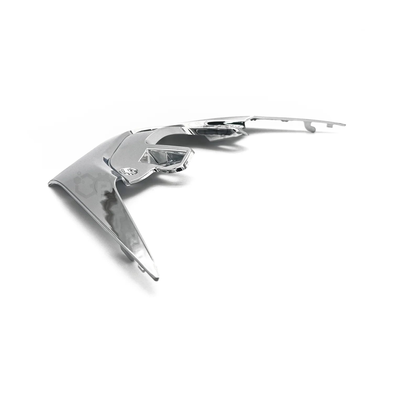 Chrome car emblem on a white background