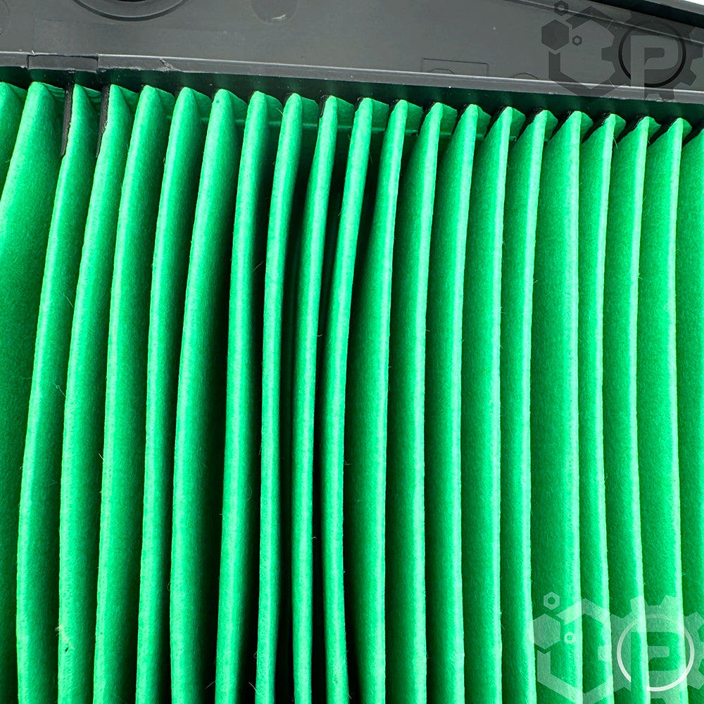 Close-up of a green pleated filter with a brand logo in the corner.