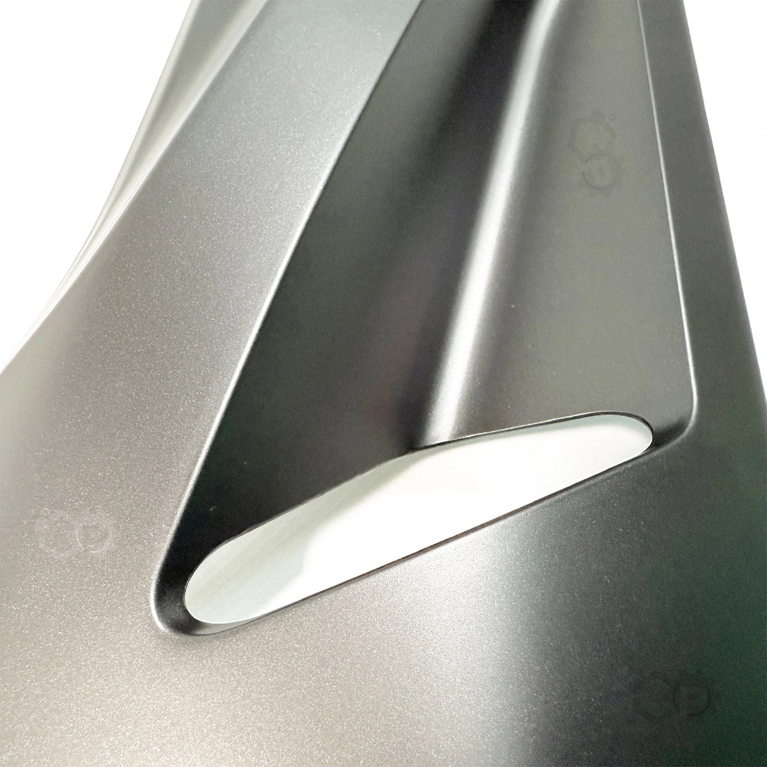 Close-up of a metallic object with a reflective surface