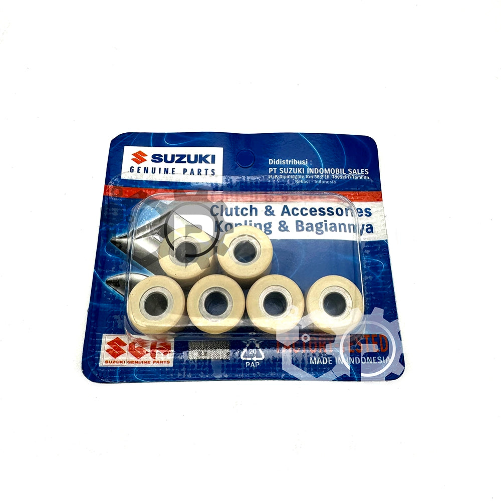 Pack of Suzuki clutch and accessory parts on a blue packaging background