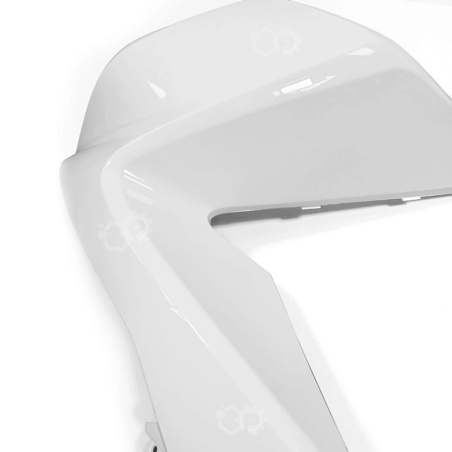 Close-up of a white motorcycle fairing with a glossy finish on a white background