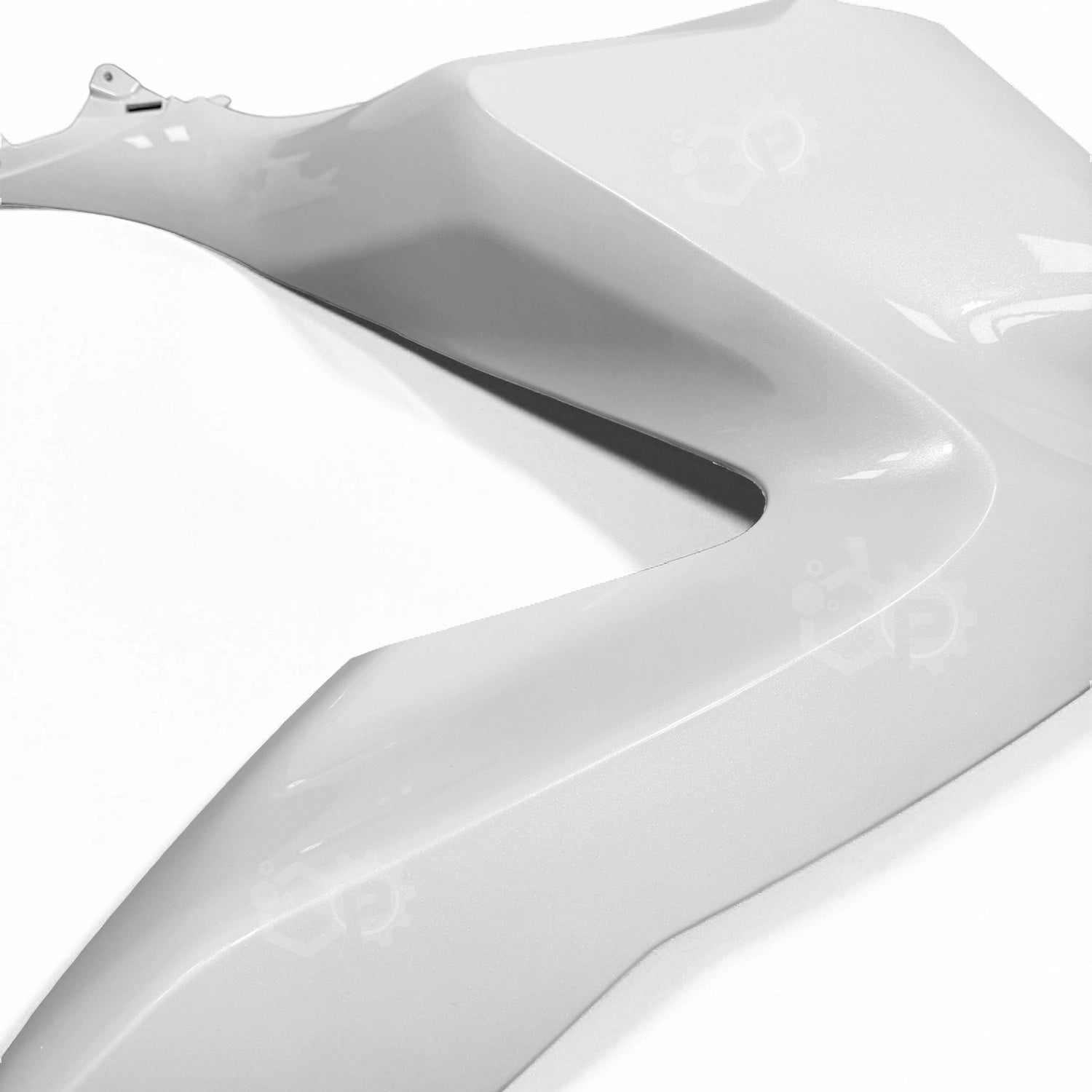 Close-up of a white motorcycle fairing on a white background