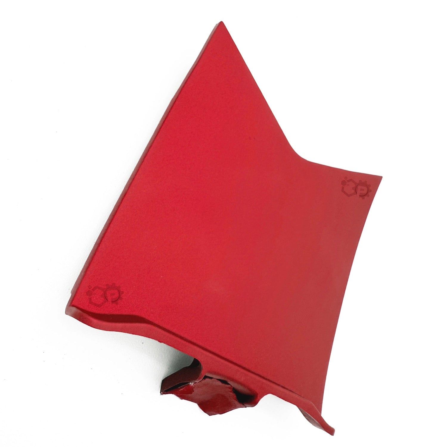 Red plastic component on a white background