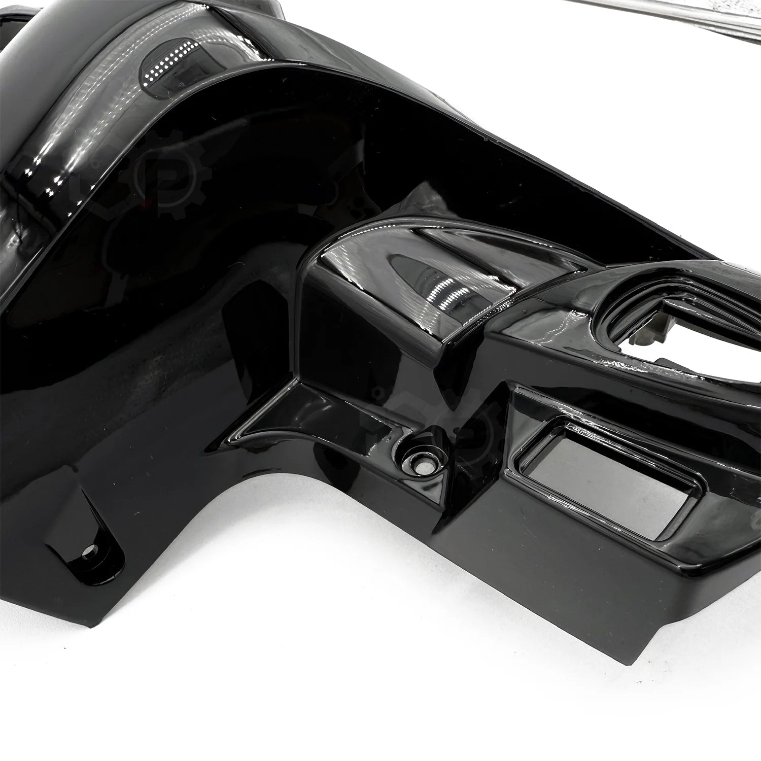 Close-up of a black motorcycle fender on a white background