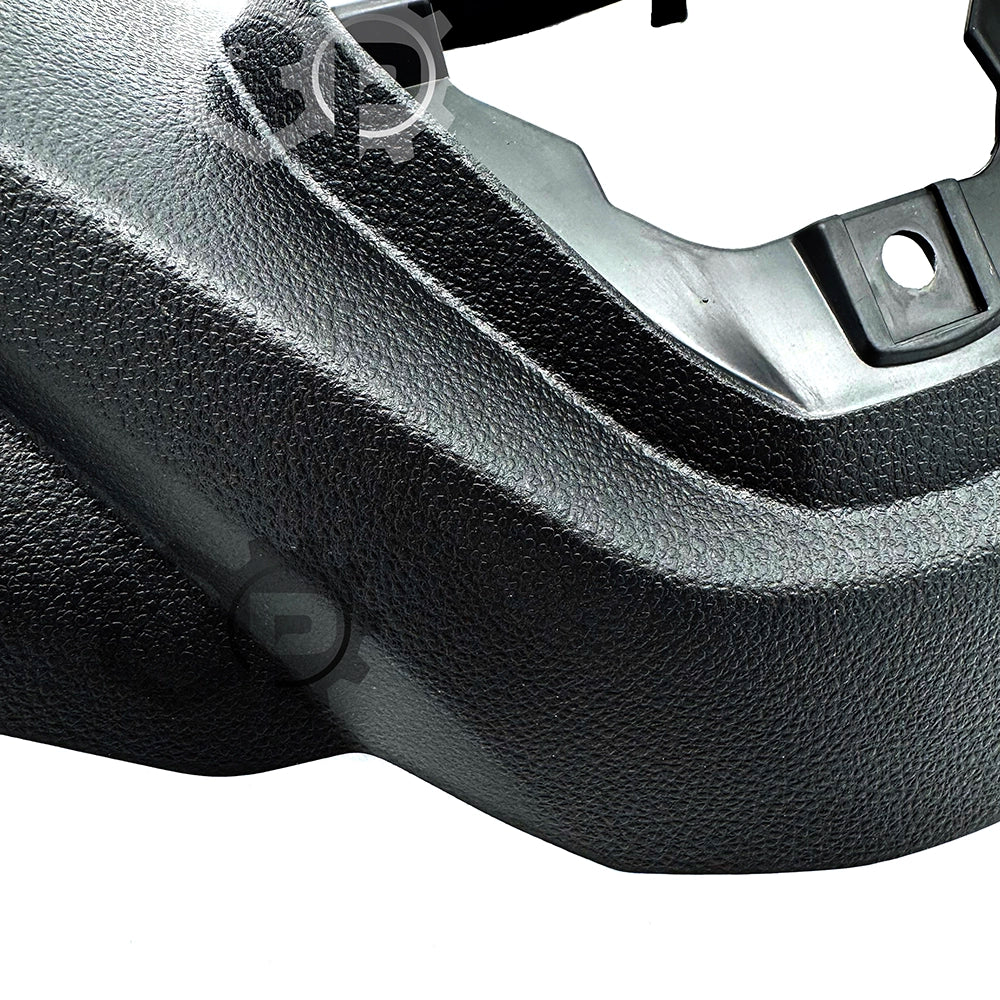 Close-up of a black plastic component on a white background