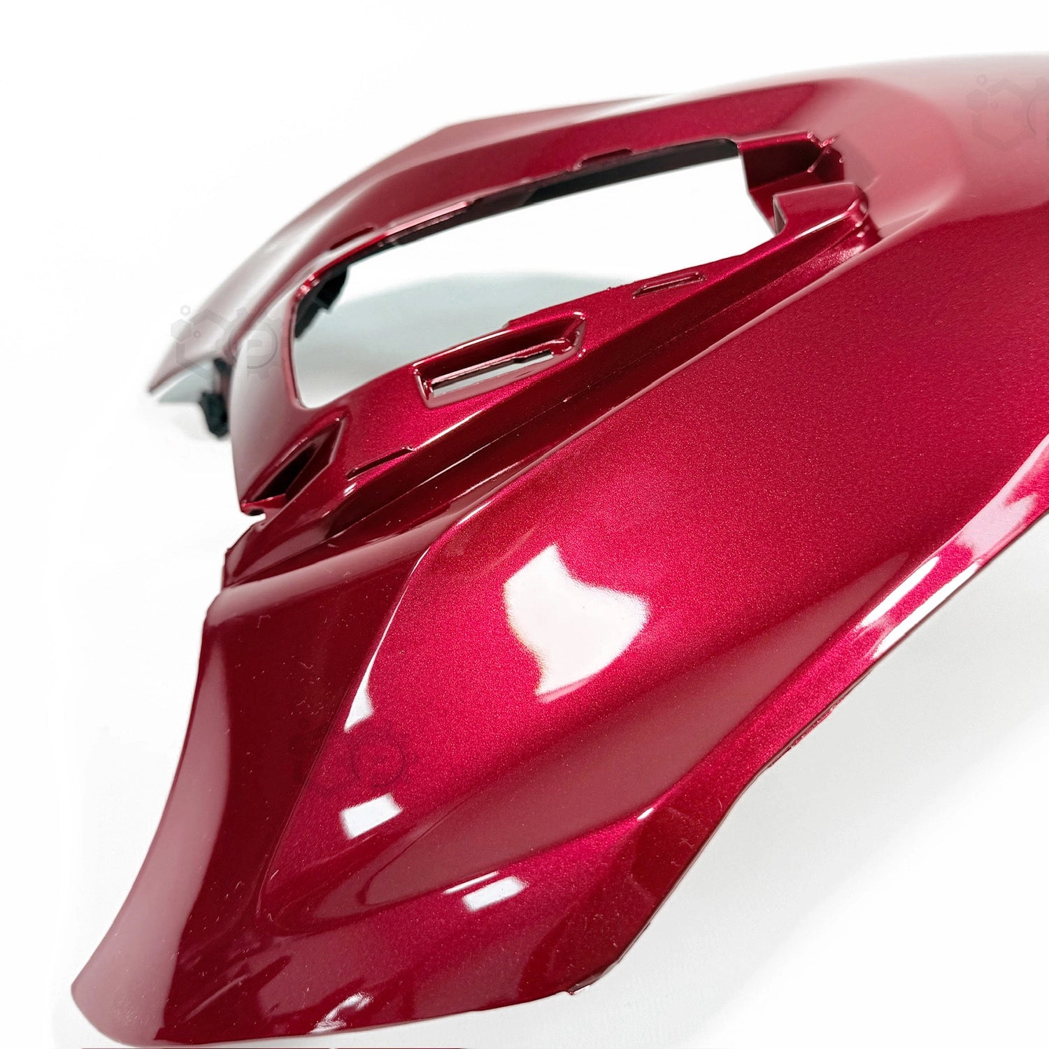 Red motorcycle fairing on a white background