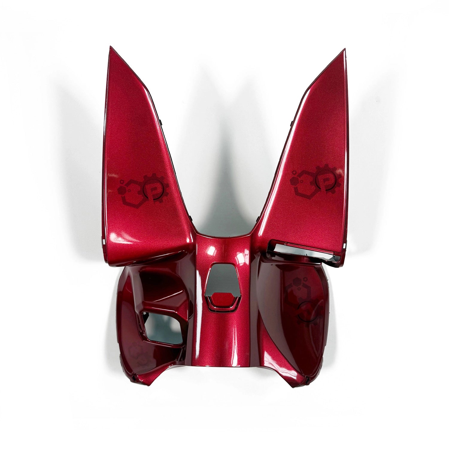 Red motorcycle fairing with brand logo on a white background