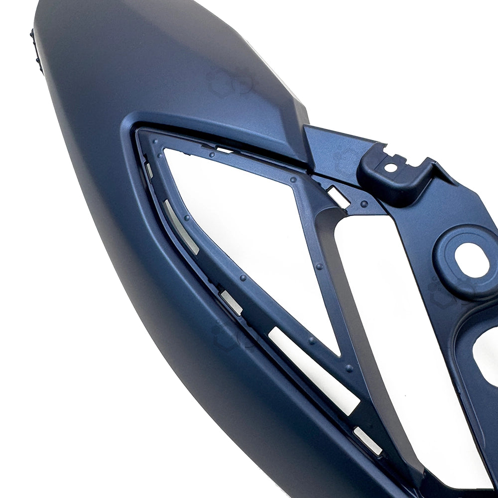Close-up of a blue motorcycle wheel rim on a white background