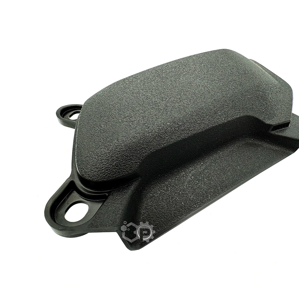 Black mechanical component on a white background