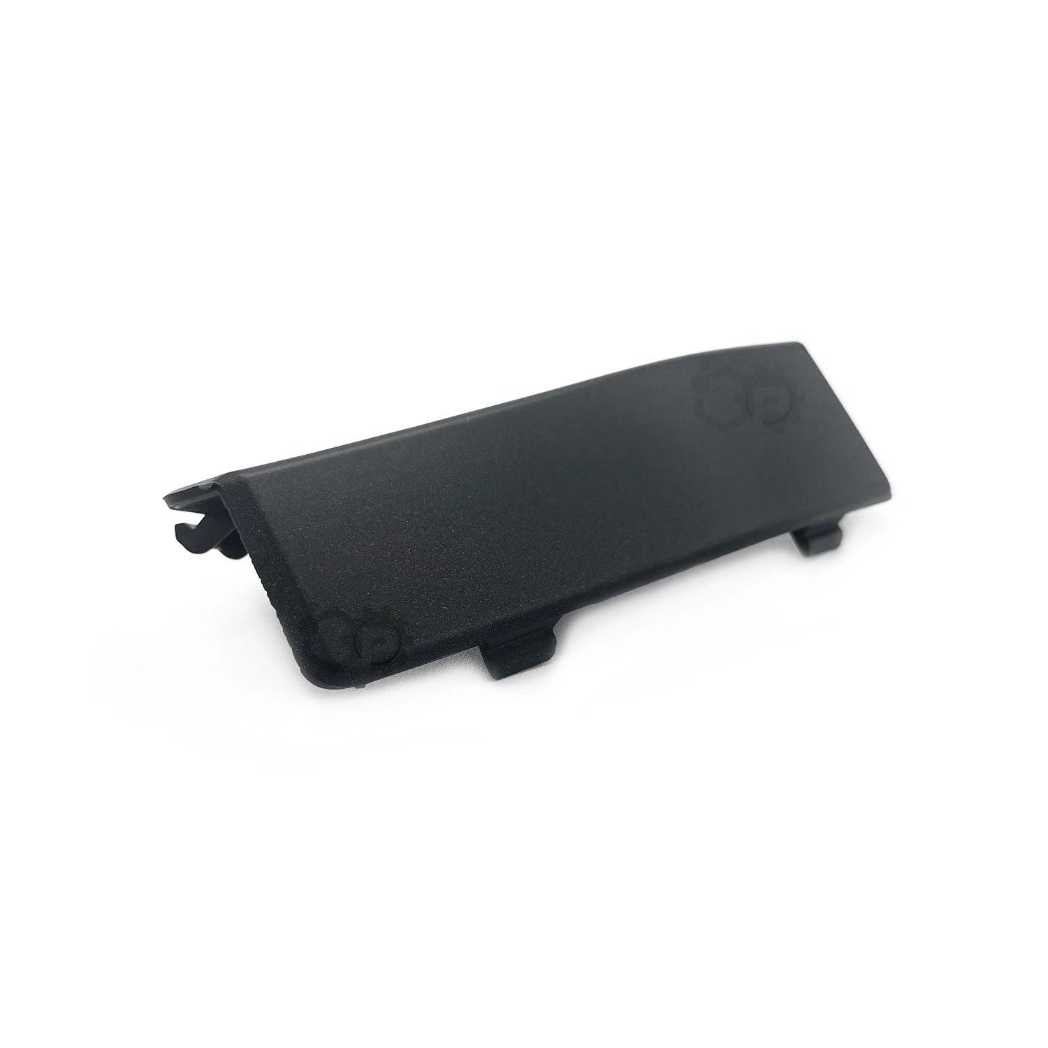 Black plastic component on a white background