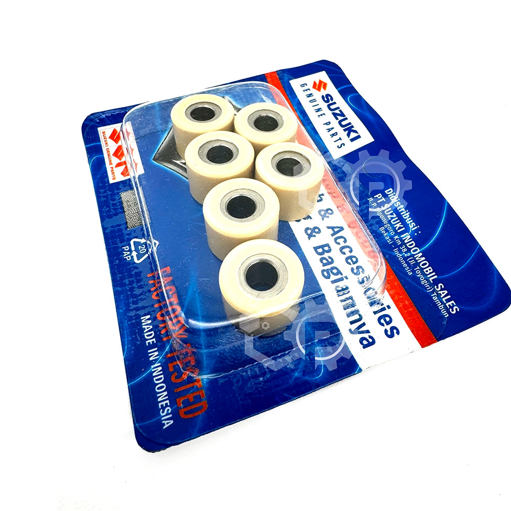 Packaged Suzuki motorcycle parts on a white background