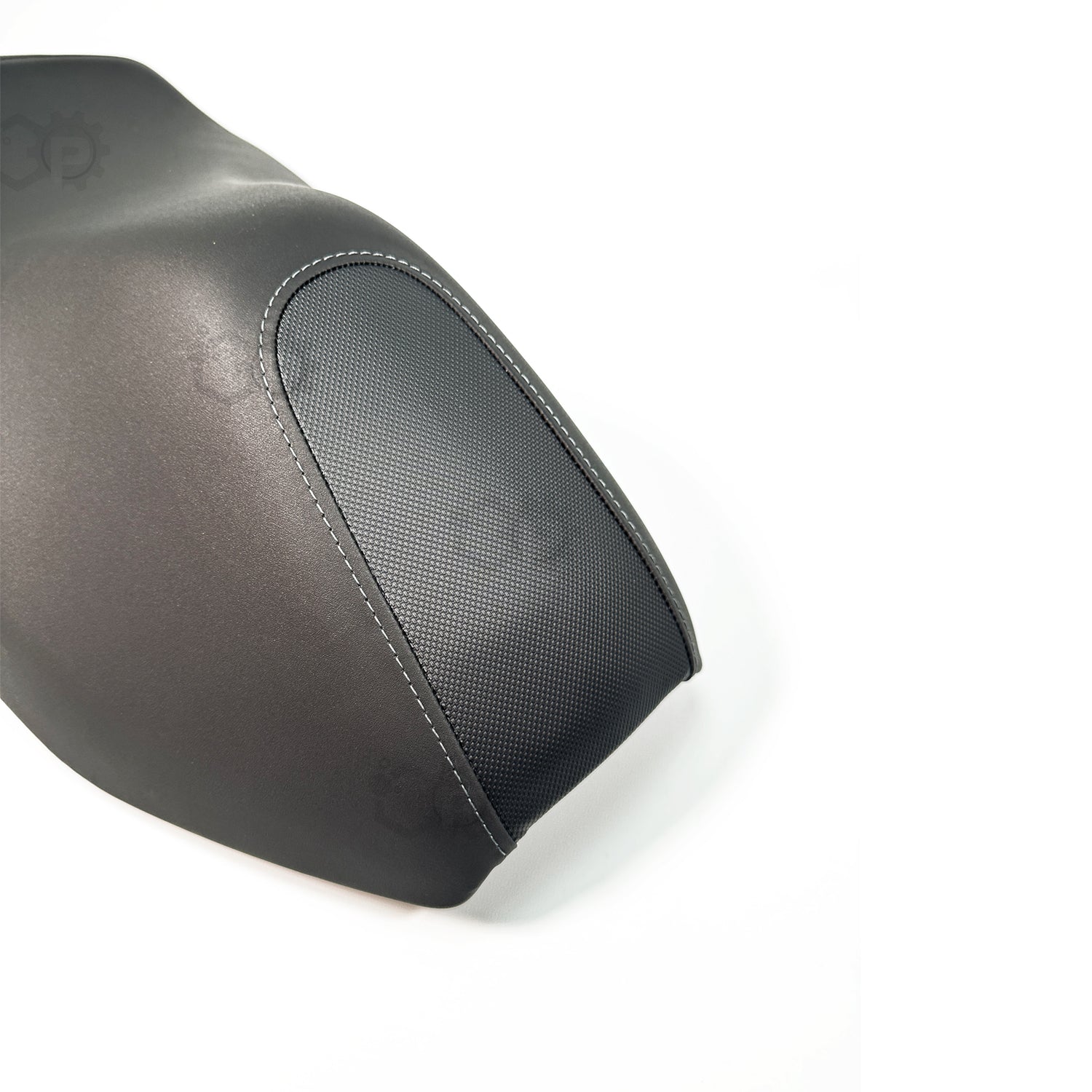Black leather motorbike seat cover on a white background