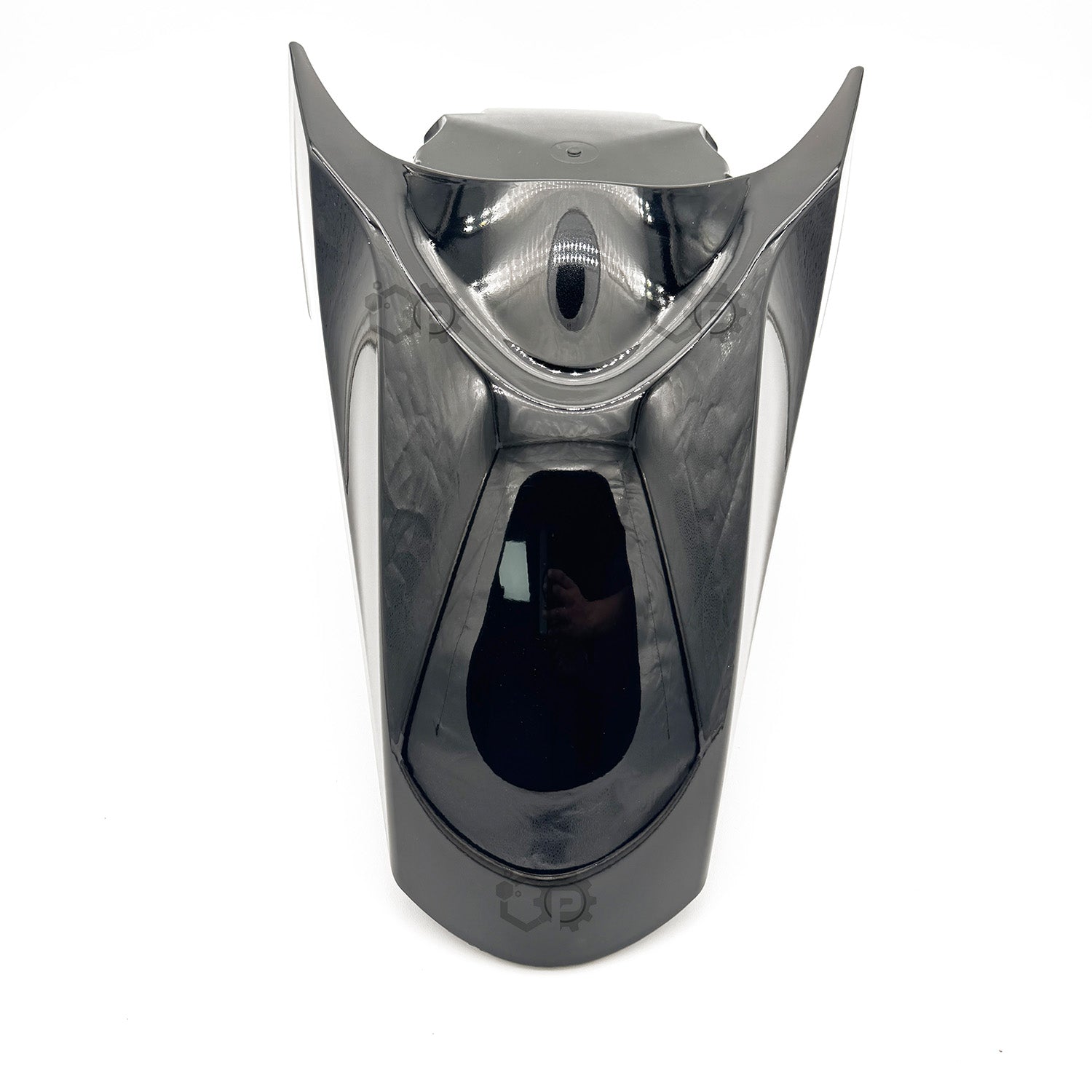 Chrome motorcycle fairing on a white background