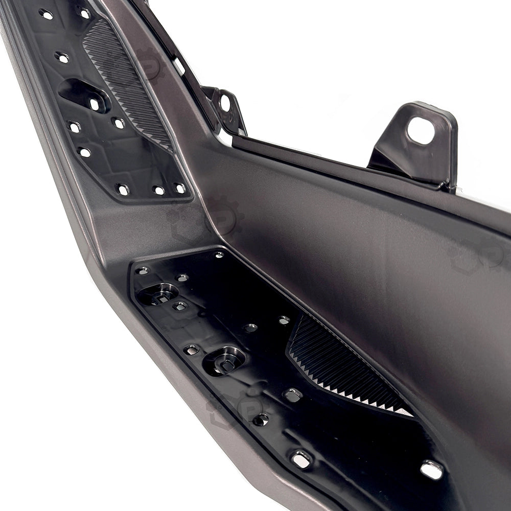 Close-up of a black metal bumper with mounting brackets on a white background