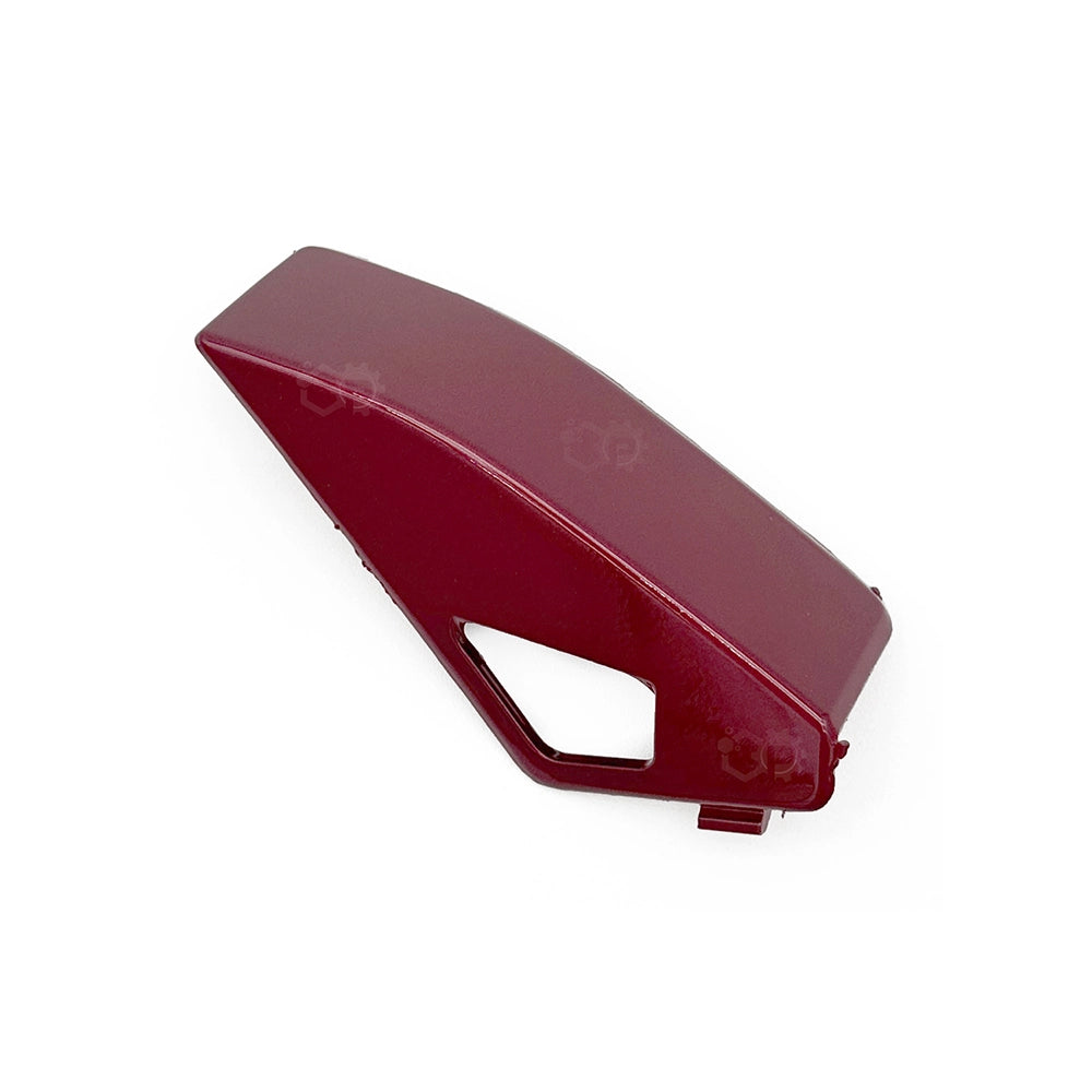 Red plastic component on a white background
