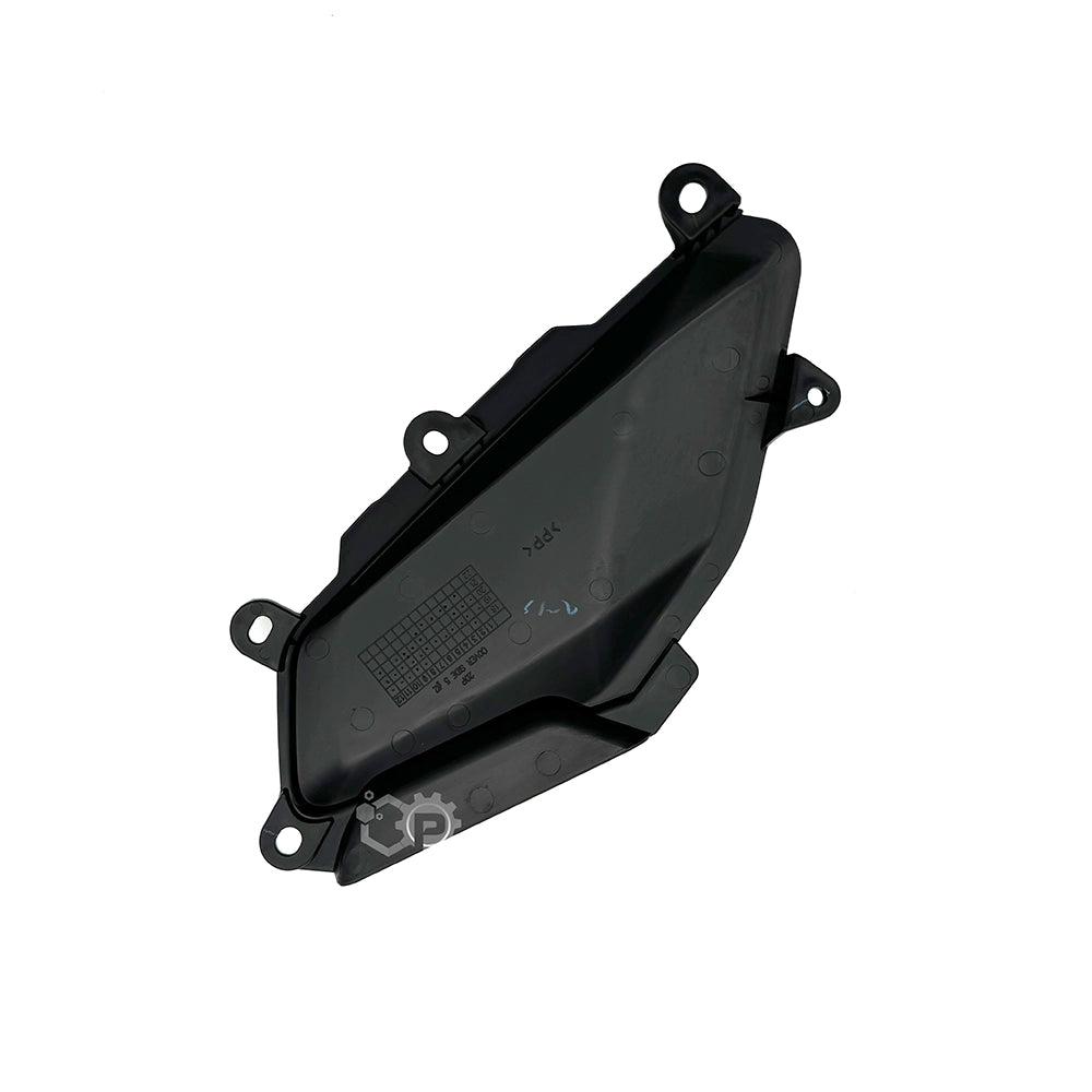Black plastic automotive part on a white background