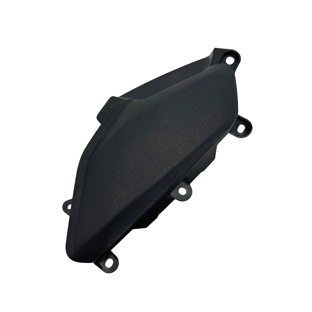 Black plastic automotive part on a white background