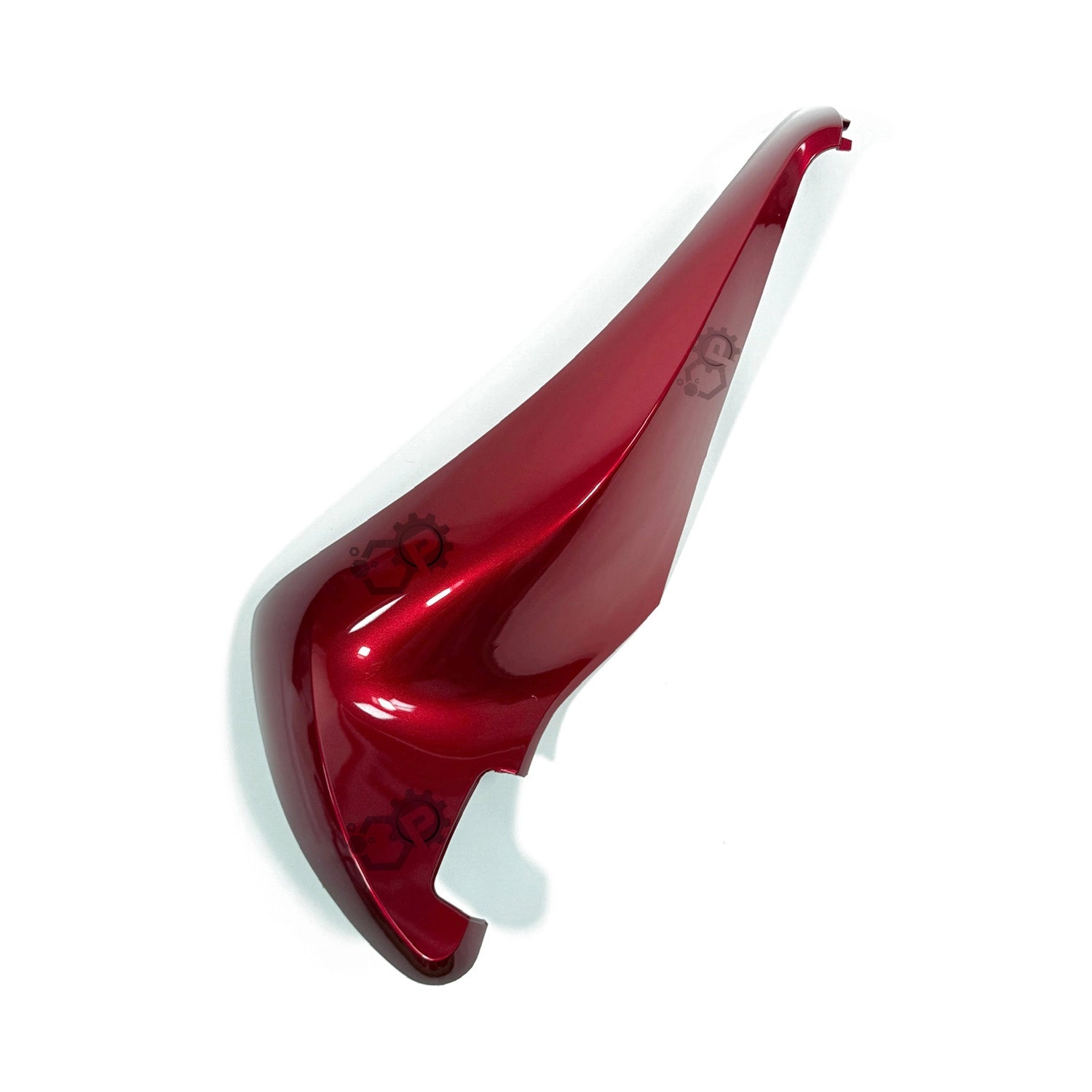 Red plastic component on a white background